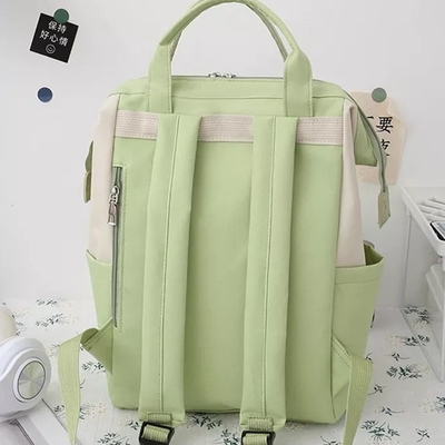 La mochila verde fija a muchachas durables de la bolsa de libros de los estudiantes del ordenador portátil