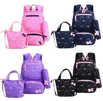 Las mochilas para las muchachas enseñan a niños lindos hacen excursionismo la fiambrera aislada Bookbags fijaron el bolso